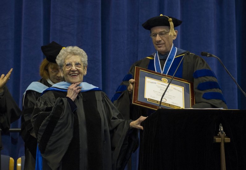 Holocaust survivor Noémi Ban, an award-winning public speaker and teacher, receives an honorary doctorate at Western Washington University's commencement on March 23, 2013. Ban also delivered the commencement address. Photo by Dan Levine | for WWU