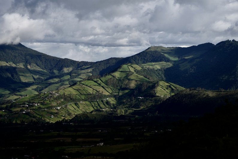 Clouds dapple the mountains around Otavalo.