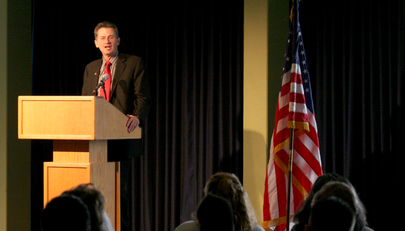 WWU President Bruce Shepard speaks at a Veterans Day ceremony in the Viking Union Multipurpose Room on Tuesday, Nov. 10. Photo by Michael Leese | WWU intern
