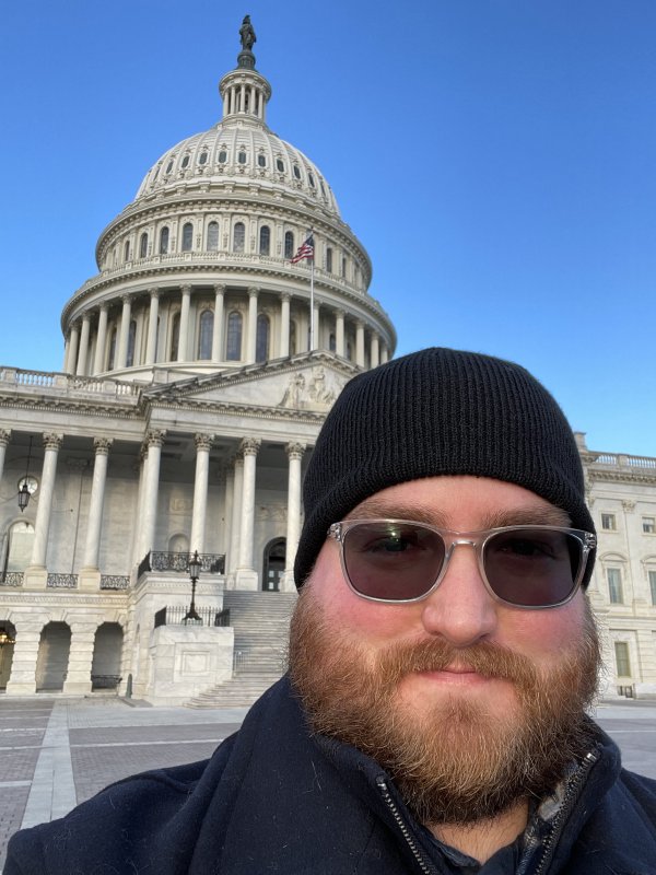 Mitch Hebner selfie in front of the U.S. Capitol building 