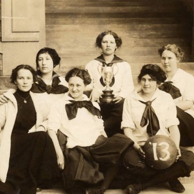Going back 100 years for this shot of the seniors on our 1913 women's basketball team, posed on the front steps of Old Main with the Kline Cup. The Kline Cup series pitted the senior class against the juniors. In 1913, as you can see, the seniors emerged 