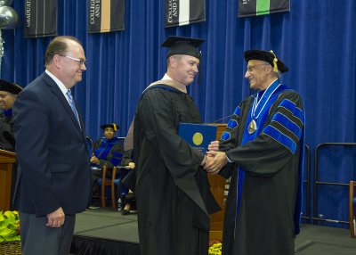 WWU Chief of Police Darin Rasmussen receives his MBA from Sabah