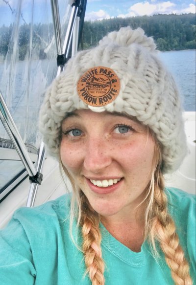 Portrait of Erin Rosenkranz outside on a boat