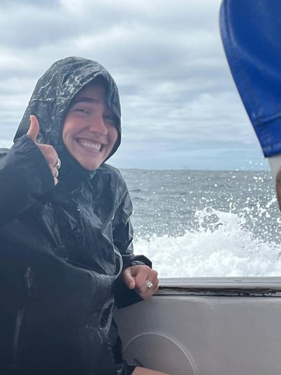 WWU student Jenavieve Barson gives a soggy thumbs up on the ferry to Isabela island.