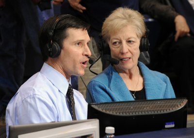 Lynda Goodrich is interviewed by ROOT Sports broadcaster Brad Adam during halftime of a WWU basketball game in Carver Gymnasium. Courtesy photo