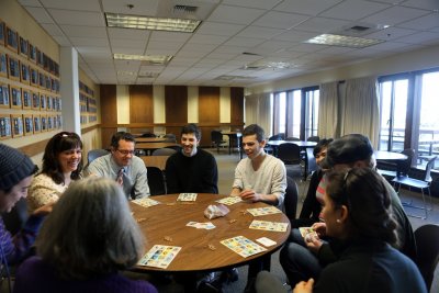 WWU faculty and staff play a Spanish bingo-style game as a vocabulary-building exercise at the weekly conversation hour in the Viking Union. The Friday conversations are in addition to the two hour-long classes that take place during the week. Photo by Ca