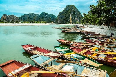 River boats tied up to the bank in Vietnam