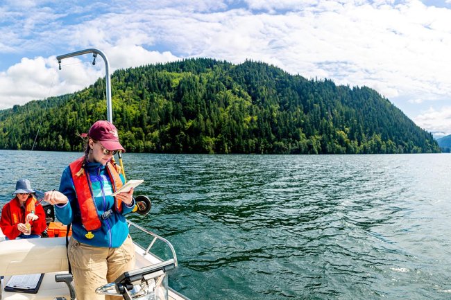 Two students in a boat on Lake Whatcom