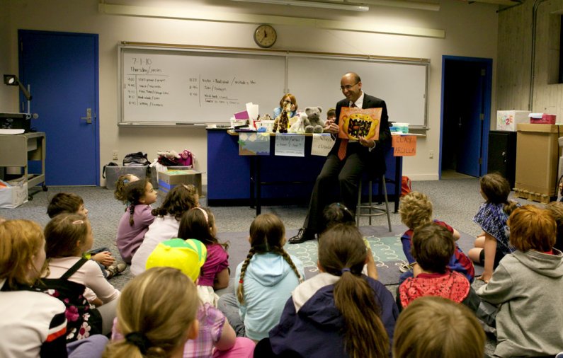 Greg Baker, who started July 1 as the new superintendent for the Bellingham School District, reads a book to schoolchildren taking part in the Western Kids Camp in the Environmental Studies Building. Baker, a WWU alumnus, read a couple of books to the chi