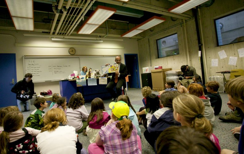 Greg Baker, who started July 1 as the new superintendent for the Bellingham School District, reads the book "Where Do Balloons Go?" to schoolchildren taking part in the Western Kids Camp in the Environmental Studies Building. Baker, a WWU alumnus, read a 
