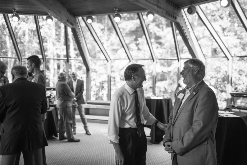 John Lawson chats with Brian Burton, Western's associate vice president for Academic Affairs, at Lawson's retirement party June 30. Photo by Jonathan Williams / WWU