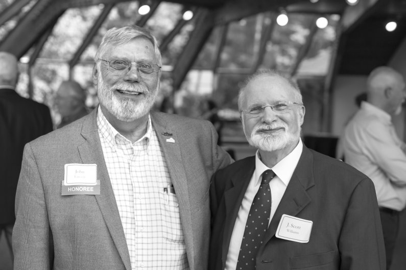 John Lawson and J. Scott Williams pose for a photo at Lawson's retirement party June 30. Williams retired from Western several years ago. Photo by Jonathan Williams / WWU