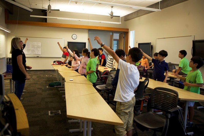 South Korean students participate in a lesson on learning the meaning of nouns and adjectives during the Global Connections camp Friday, July 24 2015. Photo by Mariko Osterberg / WWU Communications and Marketing intern 