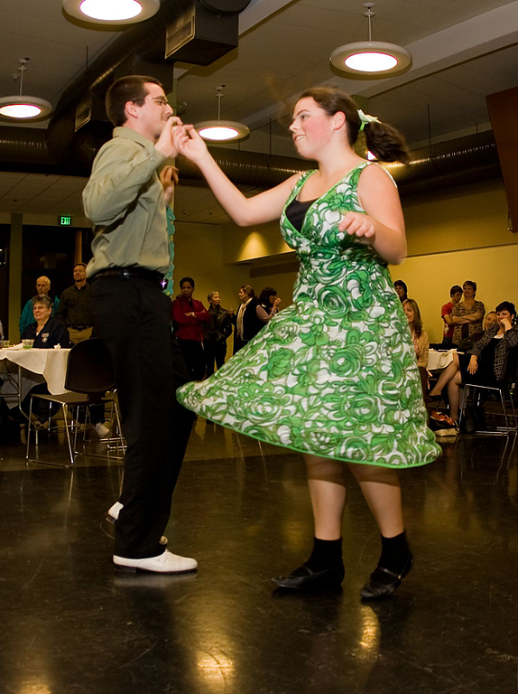 Chris Westcott and Brenna London, members of the Associated Students Swing Kids club, boogie down for Western's faculty and staff at the university's holiday party. Photo by Jon Bergman | WWU intern