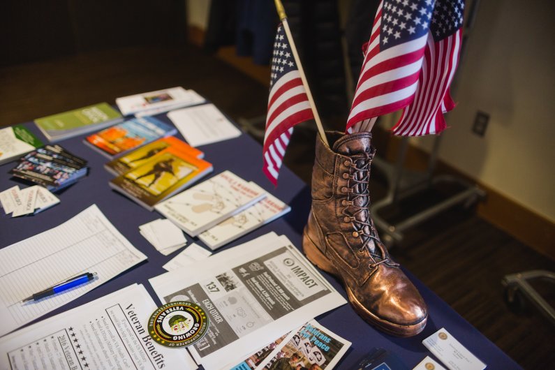 Attendees of a summit aimed at addressing the needs of Whatcom County veterans discuss possible solutions Tuesday, March 22, in the Viking Union Multipurpose Room at WWU. Photo by Rhys Logan / WWU