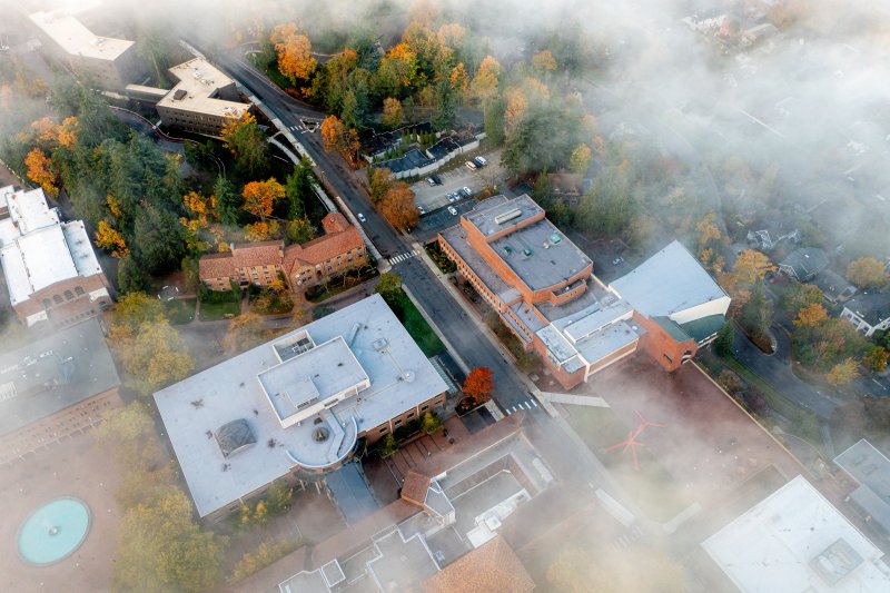drone view of Western's campus under a thin layer of clouds during October 2023